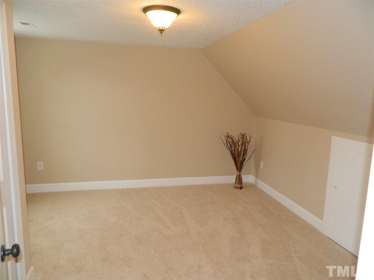 3824 Old Coach Road Raleigh, NC 27616 - Photo 16 of 25 a view of an empty room
