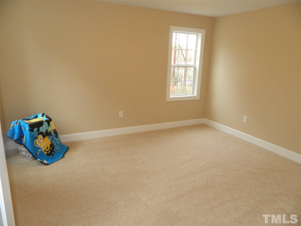 3824 Old Coach Road Raleigh, NC 27616 - Photo 18 of 25 an empty room with windows