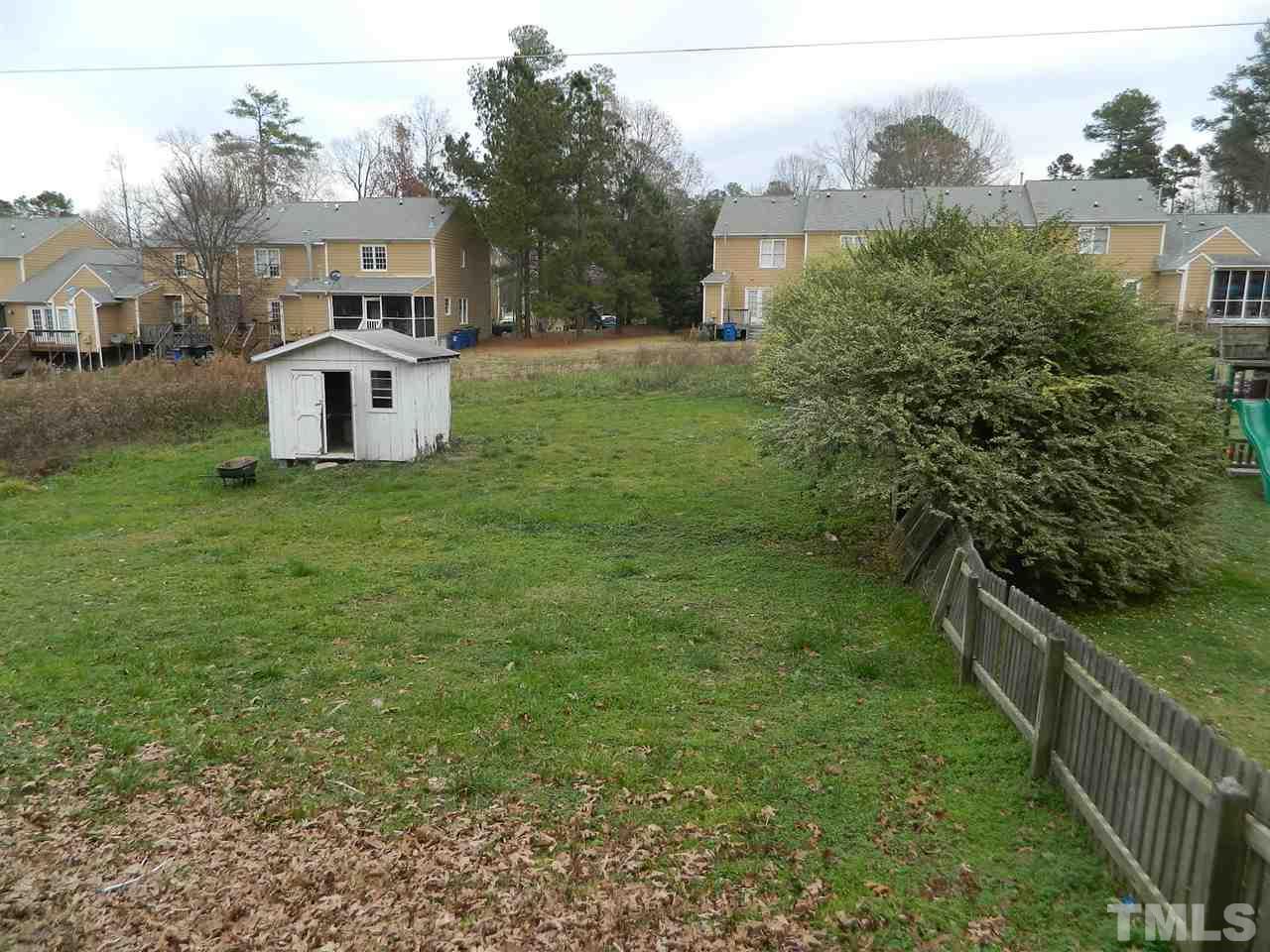3824 Old Coach Road Raleigh, NC 27616 - Photo 23 of 25 a view of a house with a yard