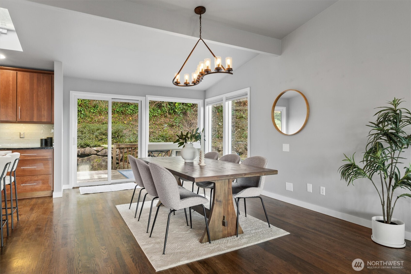 8620 Vashon View Southwest Seattle, WA 98136 - Photo 11 of 40 a view of a dining room with furniture window and wooden floor