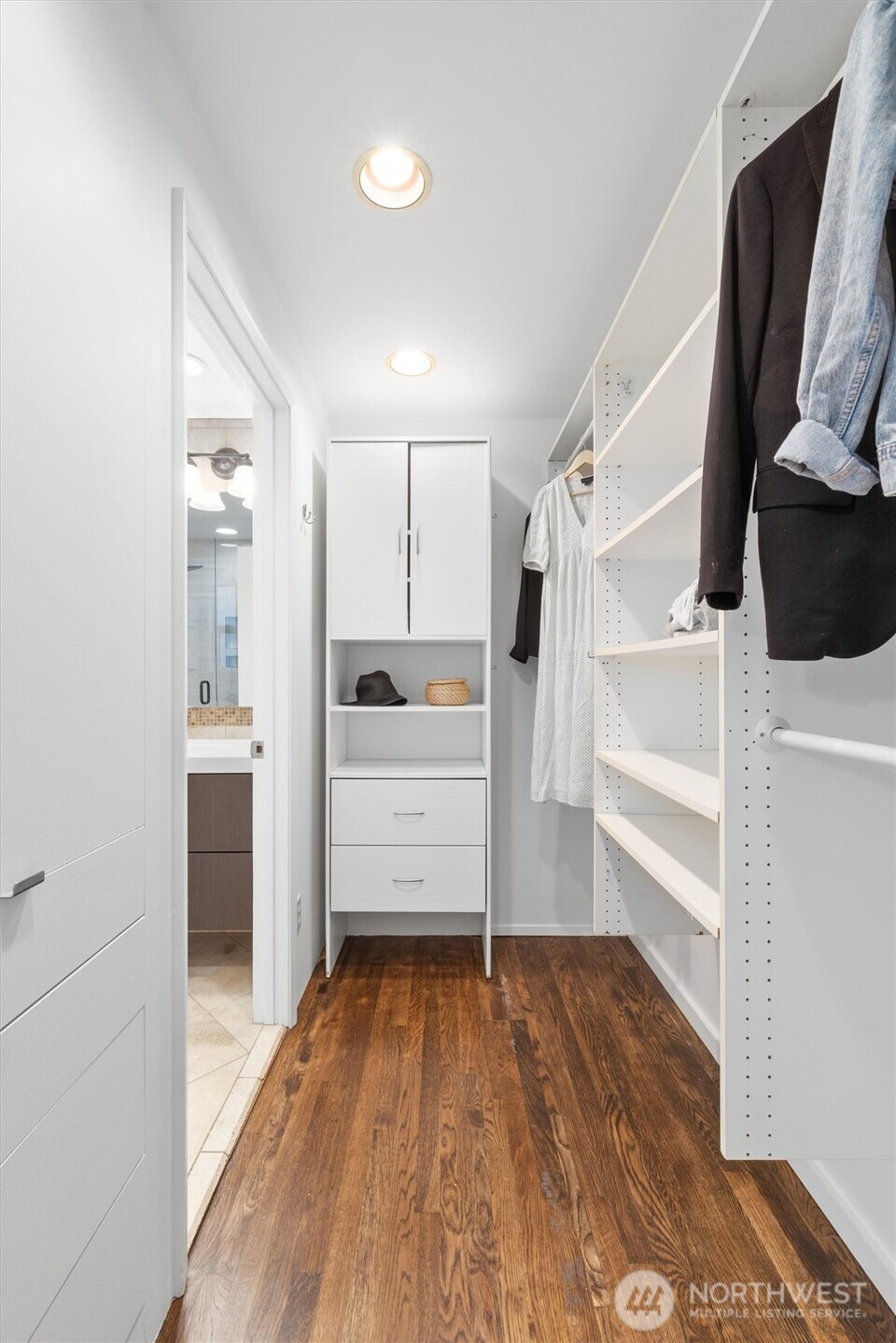 8620 Vashon View Southwest Seattle, WA 98136 - Photo 23 of 40 a view of walk in closet with empty racks