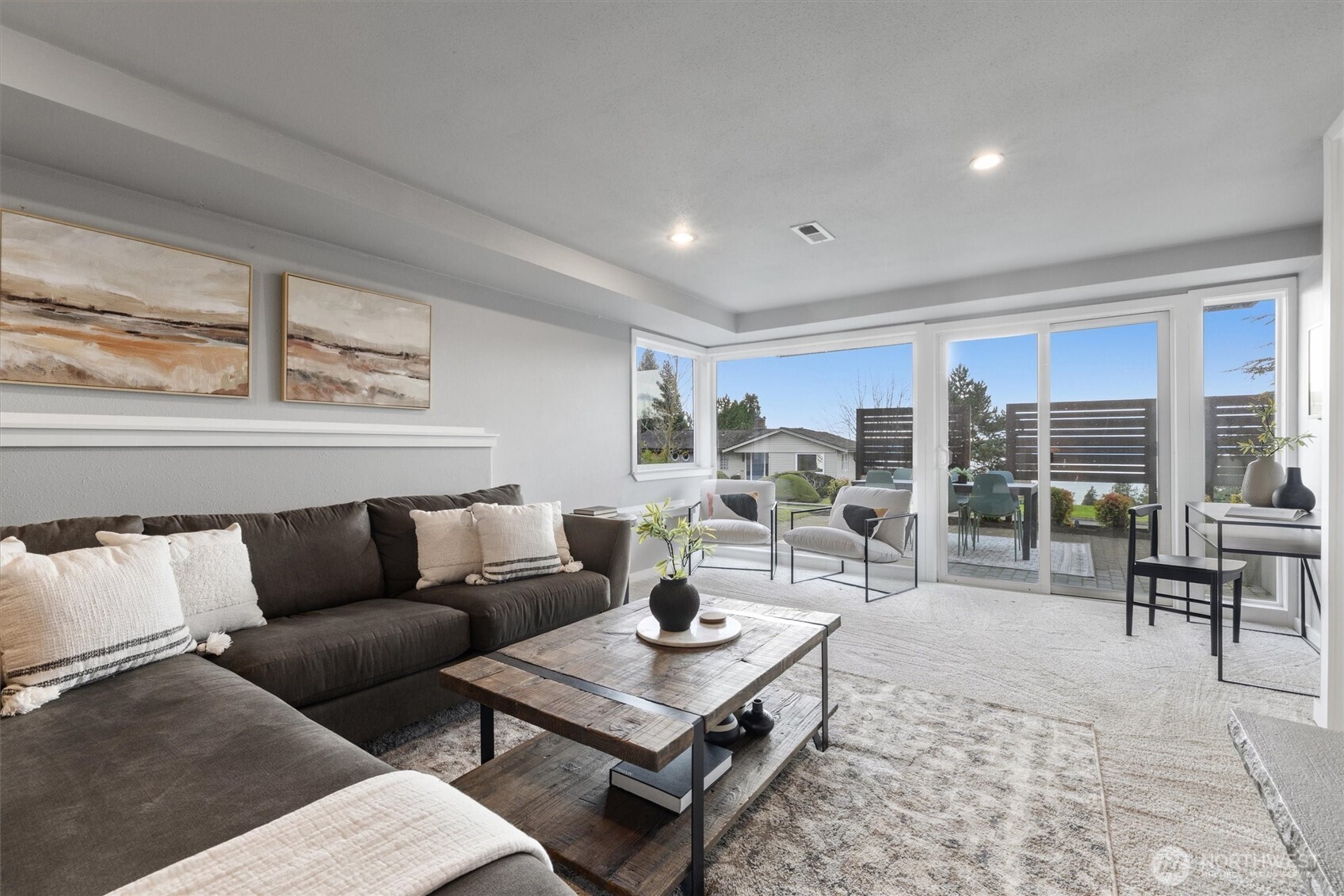 8620 Vashon View Southwest Seattle, WA 98136 - Photo 27 of 40 a living room with furniture and large window