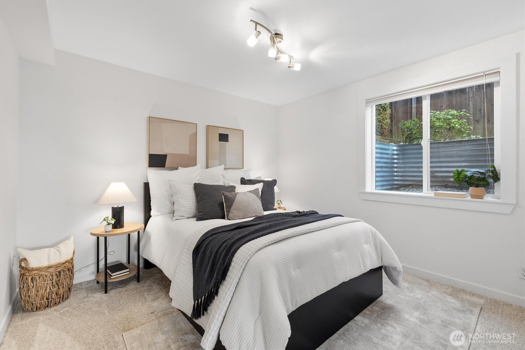 8620 Vashon View Southwest Seattle, WA 98136 - Photo 28 of 40 a bedroom with bed and a window