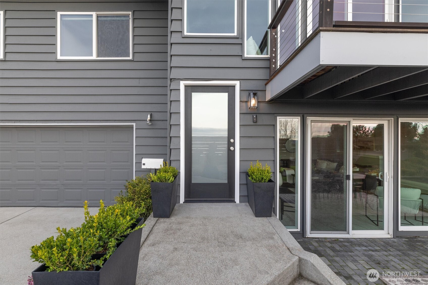 8620 Vashon View Southwest Seattle, WA 98136 - Photo 36 of 40 a view of potted plants in front of door