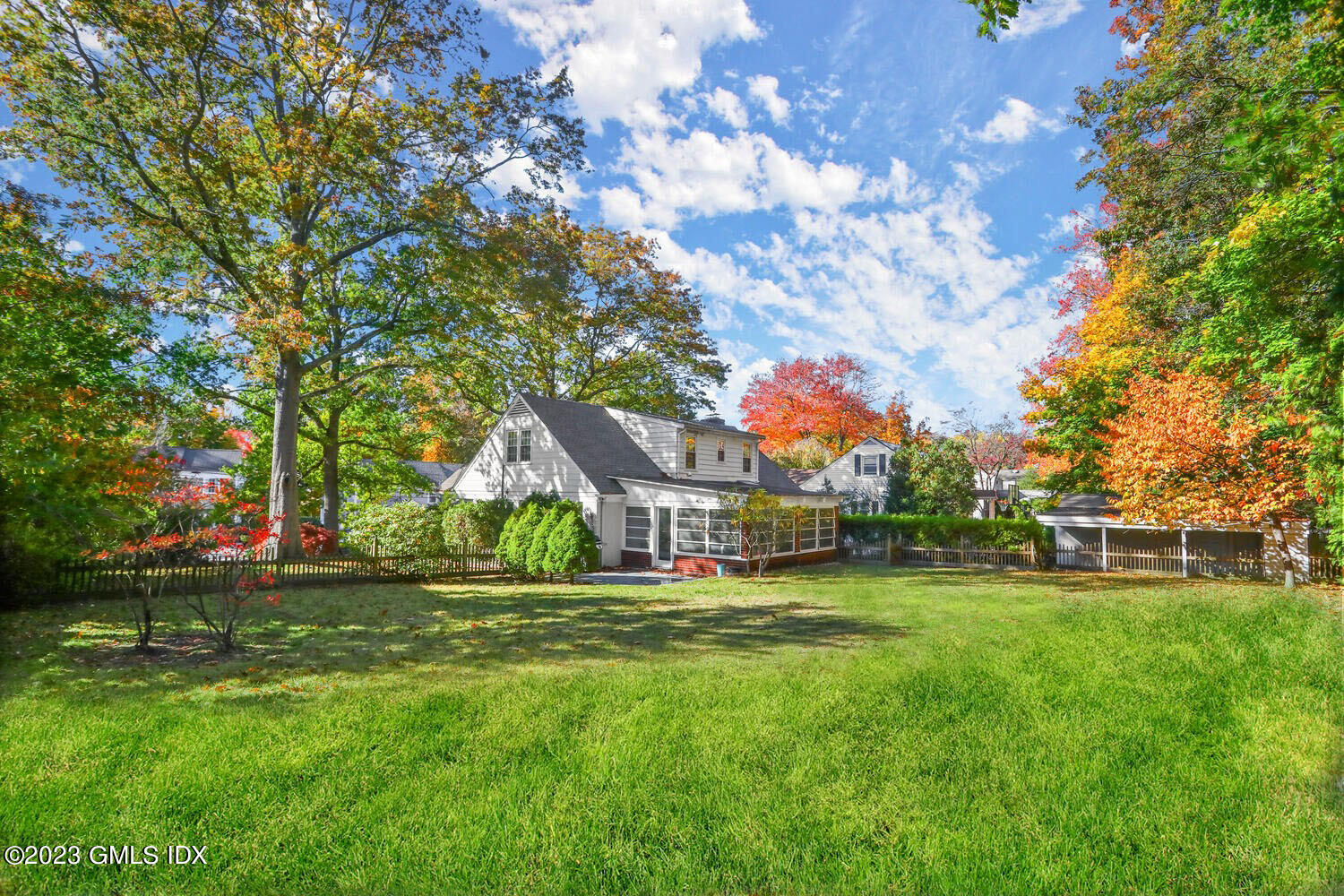 11 Manor Road Old Greenwich, CT 06870 - Photo 1 of 19 a view of a house with a big yard