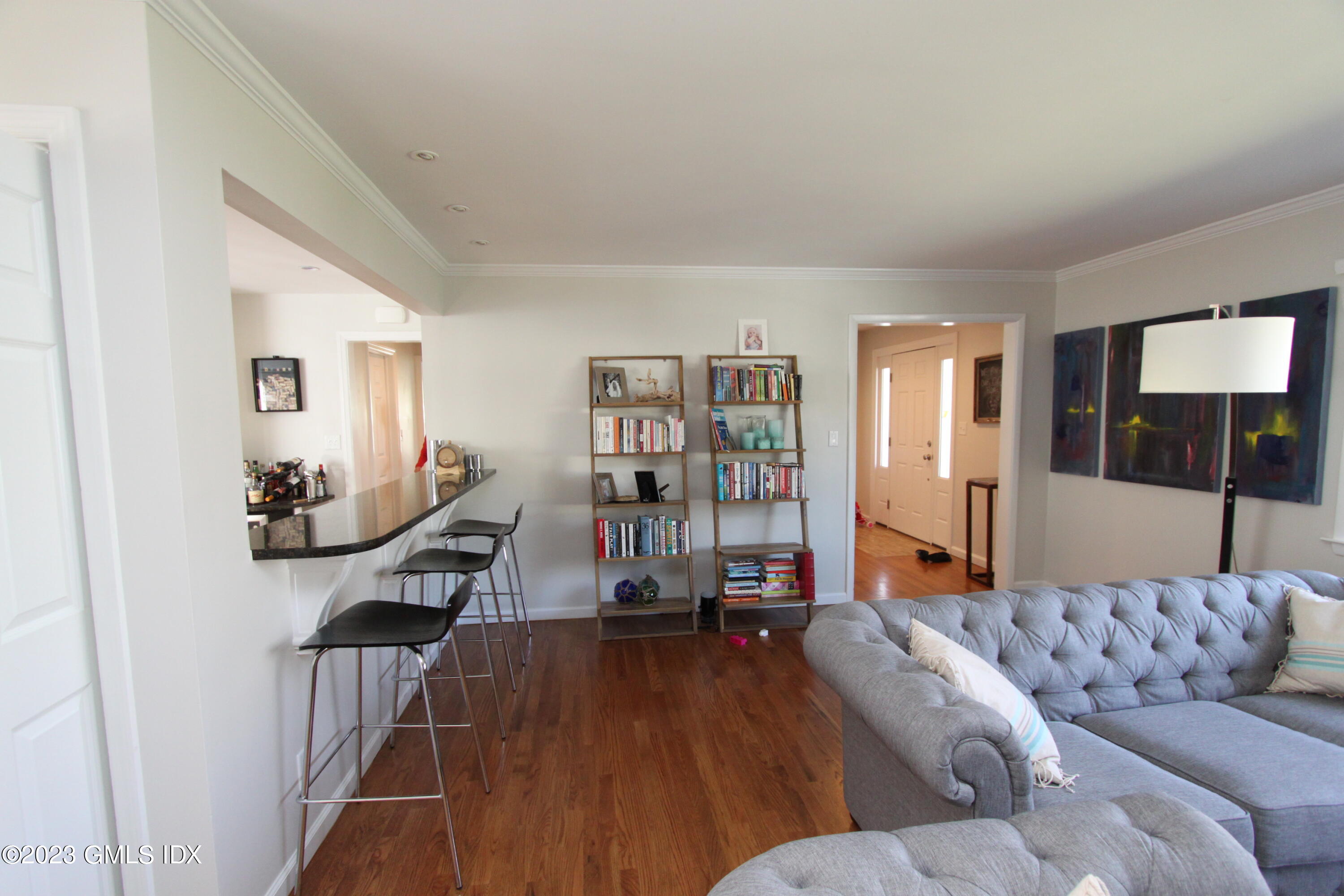 11 Manor Road Old Greenwich, CT 06870 - Photo 6 of 19 a living room with furniture and wooden floor
