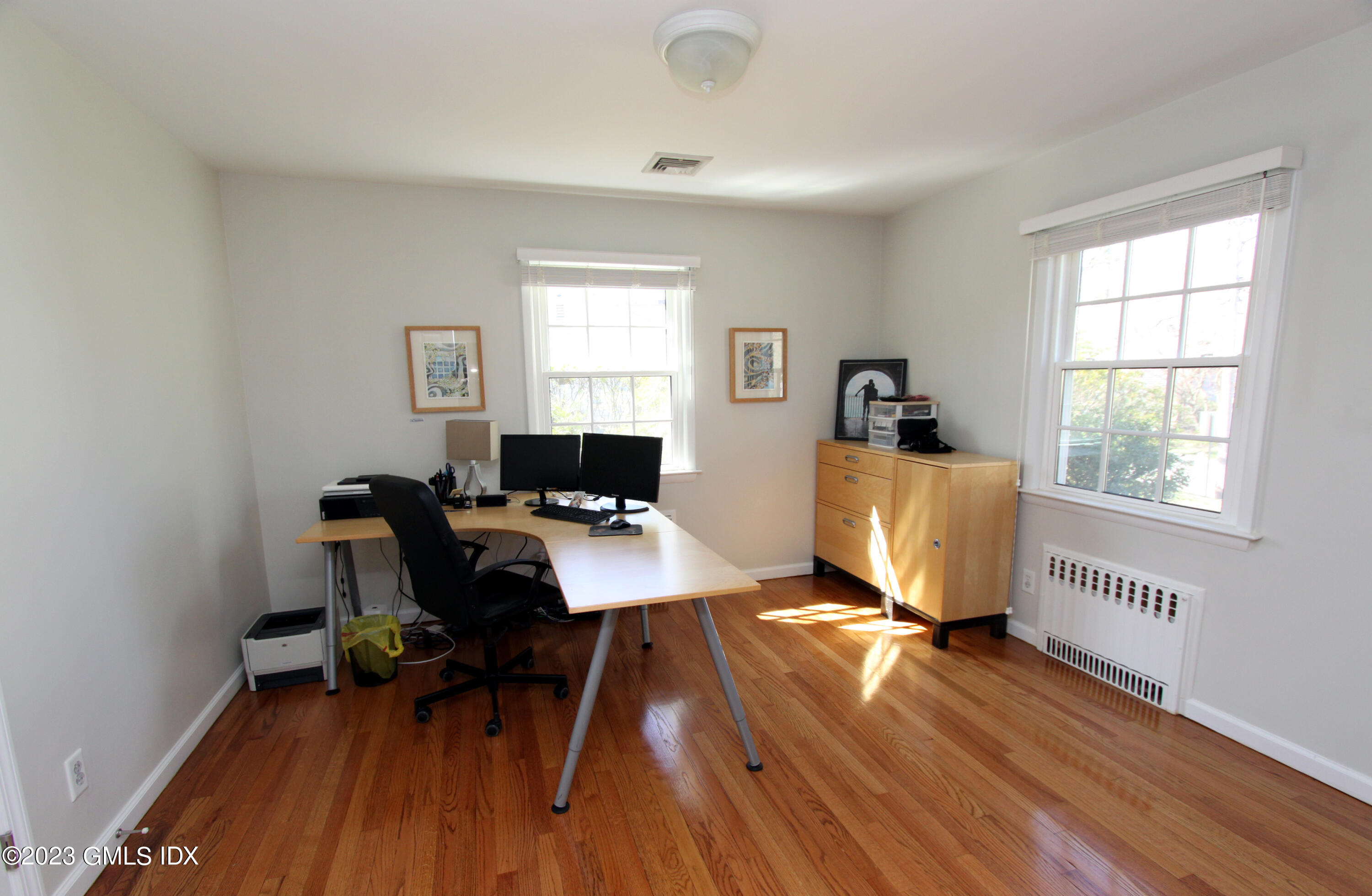11 Manor Road Old Greenwich, CT 06870 - Photo 9 of 19 a workspace with wooden floor