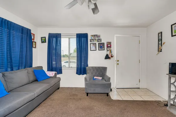 a living room with furniture and a couch