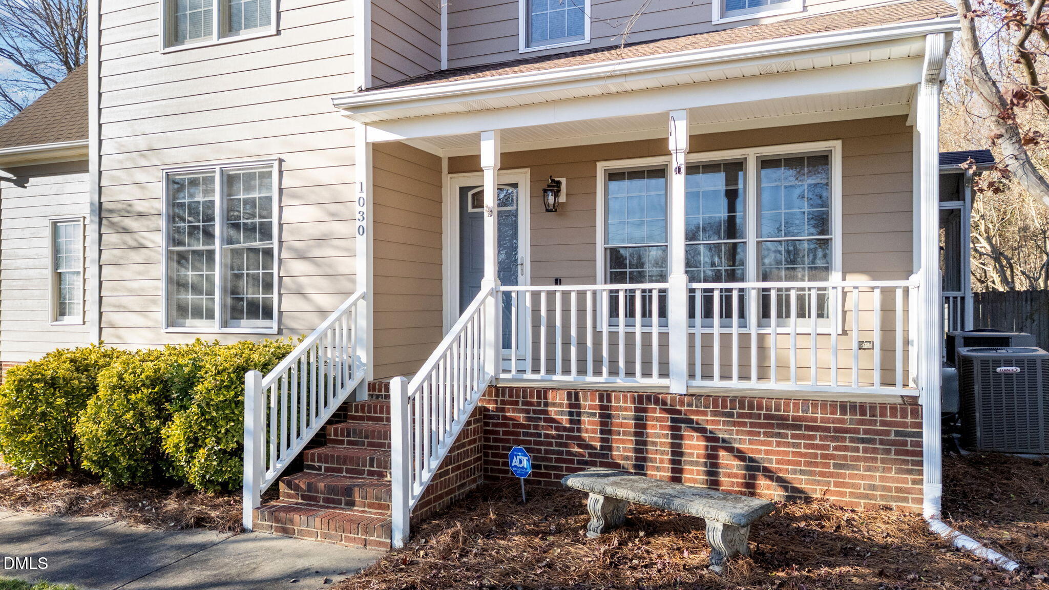 1030 Loop Road Clayton, NC 27527 - Photo 2 of 20 a view of a house with a wooden deck