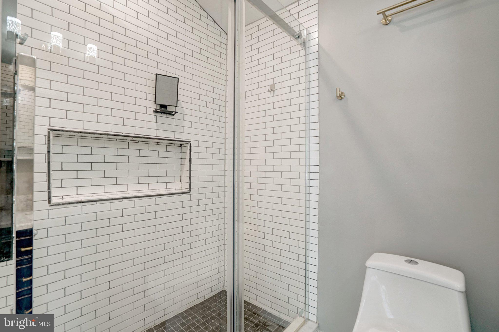8015 New Market Road Alexandria, VA 22308 - Photo 33 of 41 Primary bathroom shower