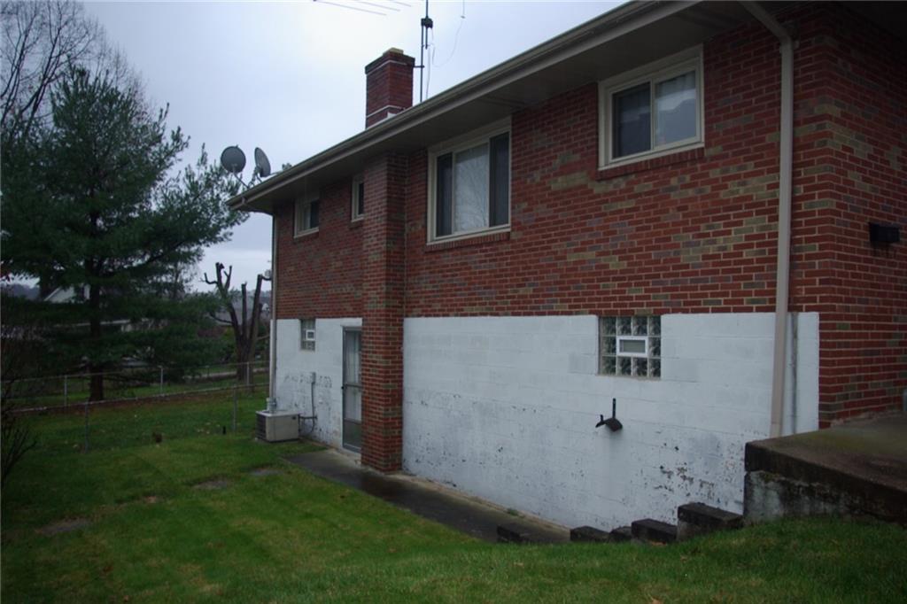 222 Singer Avenue McKees Rocks, PA 15136 - Photo 2 of 19 rear view and yard