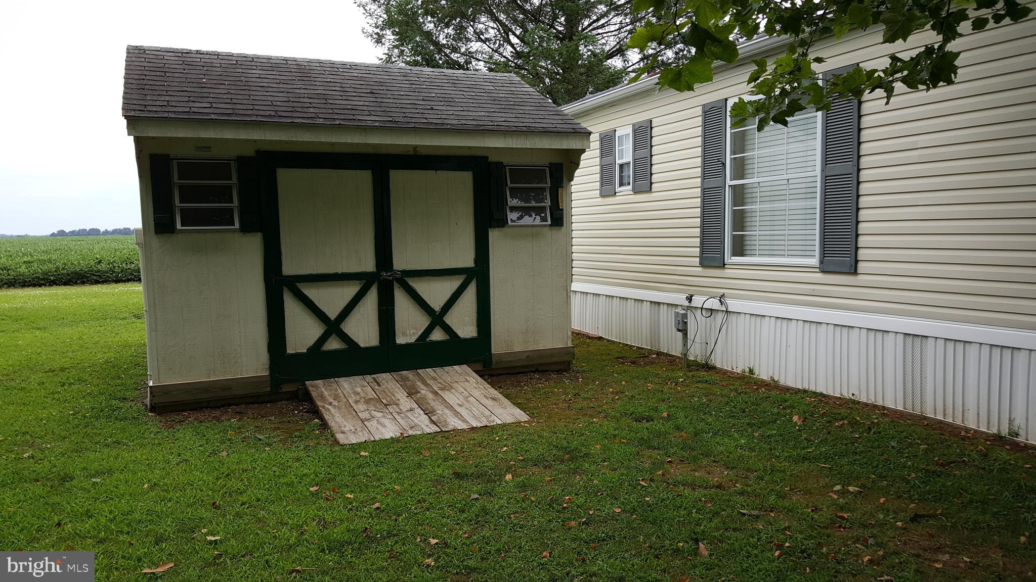 21 Cecilton Manor Drive Warwick, MD 21912 - Photo 14 of 16 Shed with push movwer included