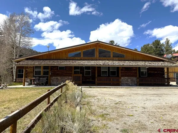 a front view of house with yard
