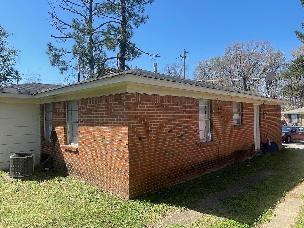 4466 Sumners Wells Road Memphis, TN 38118 - Photo 3 of 7 a view of a house with backyard and sitting area