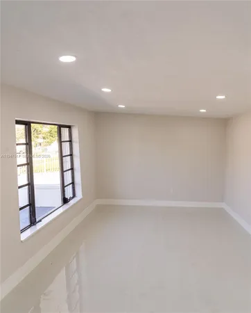 a kitchen with stainless steel appliances a refrigerator and a stove