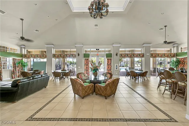 a view of a backyard with plants and swimming pool