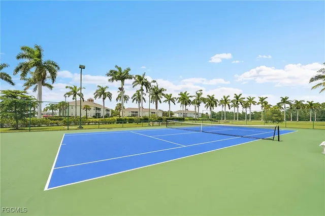 a view of an outdoor space and tennis court