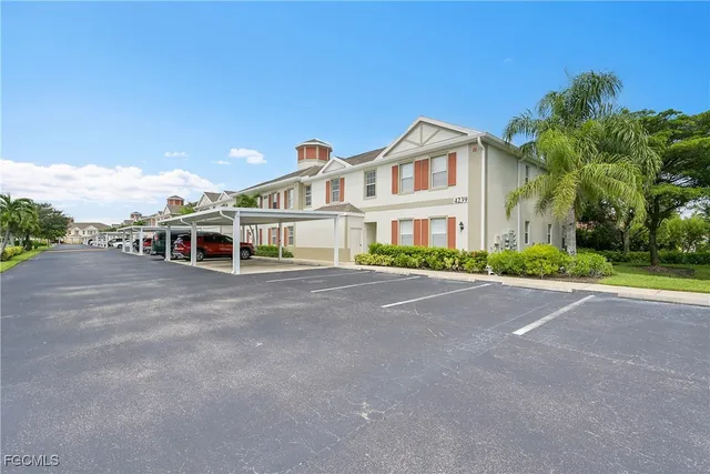 a view of house with a yard