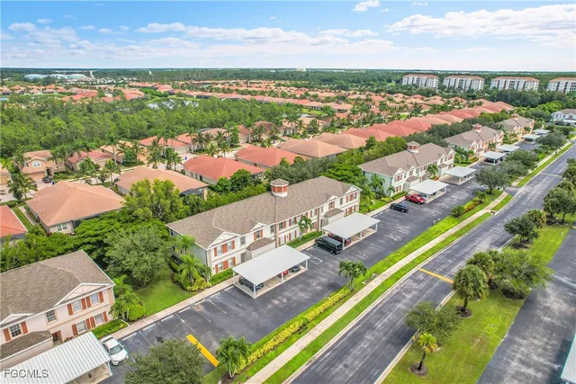 an aerial view of a city with swimming pool and outdoor space