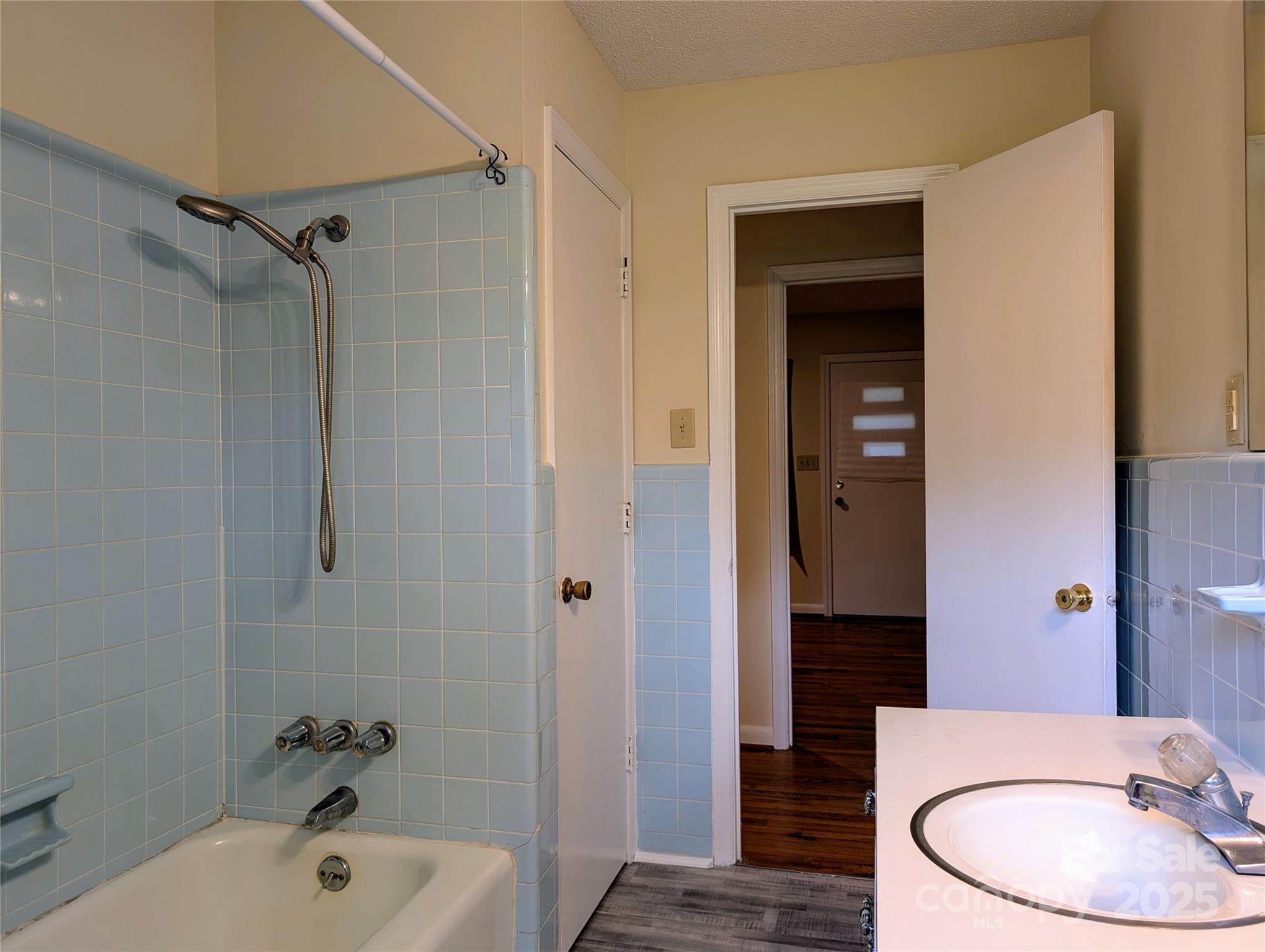5628 White Store Road Wingate, NC 28174 - Photo 20 of 31 a bathroom with a sink and a mirror