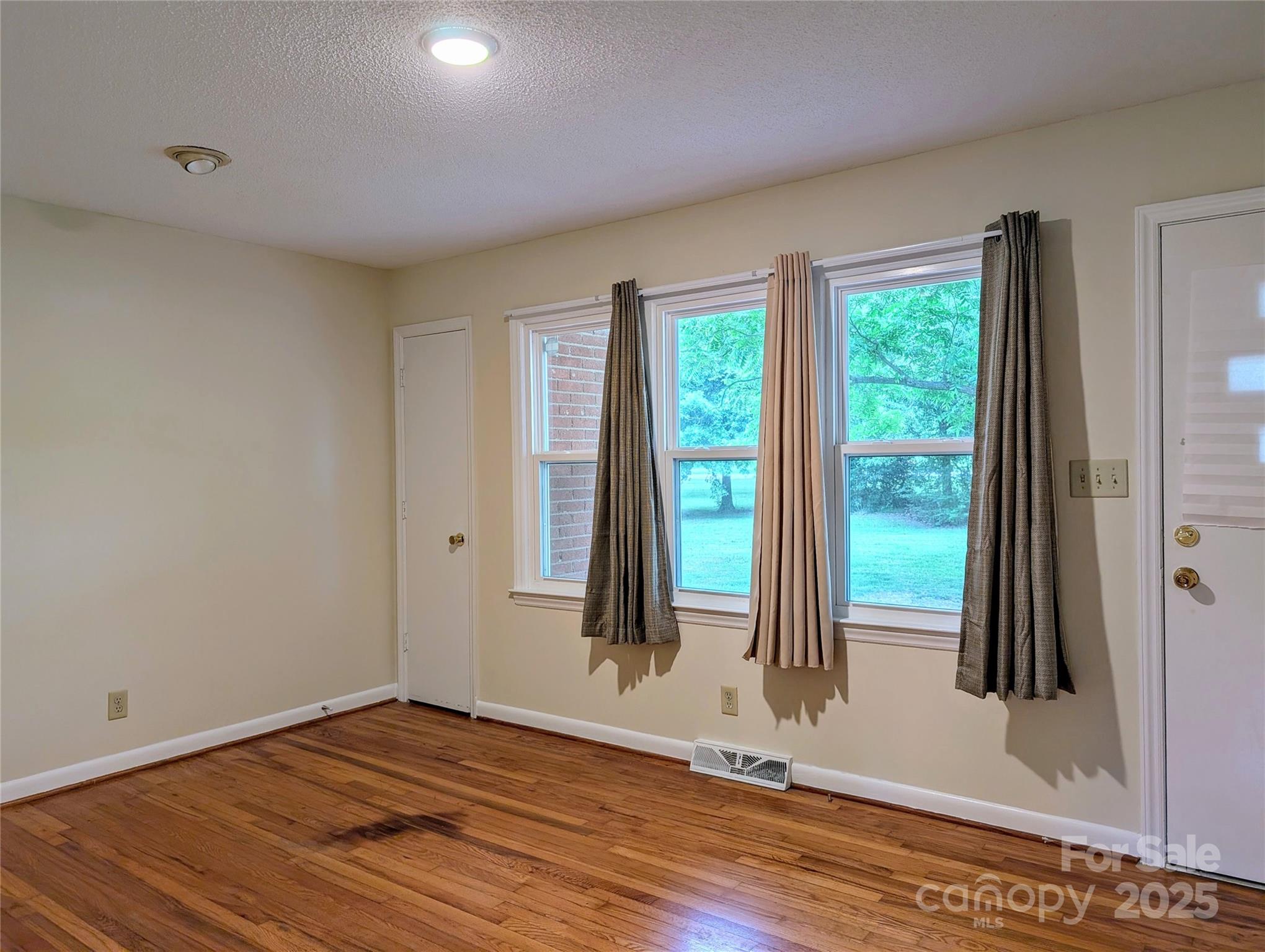 5628 White Store Road Wingate, NC 28174 - Photo 23 of 31 a view of entryway with wooden floor