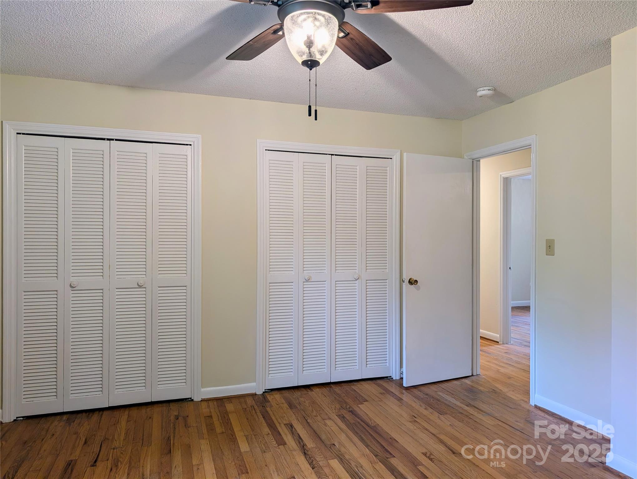5628 White Store Road Wingate, NC 28174 - Photo 26 of 31 a view of hallway with wooden floor