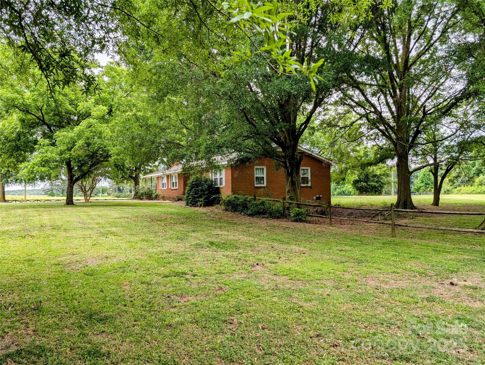 5628 White Store Road Wingate, NC 28174 - Photo 3 of 31 a house view with a trees in the background