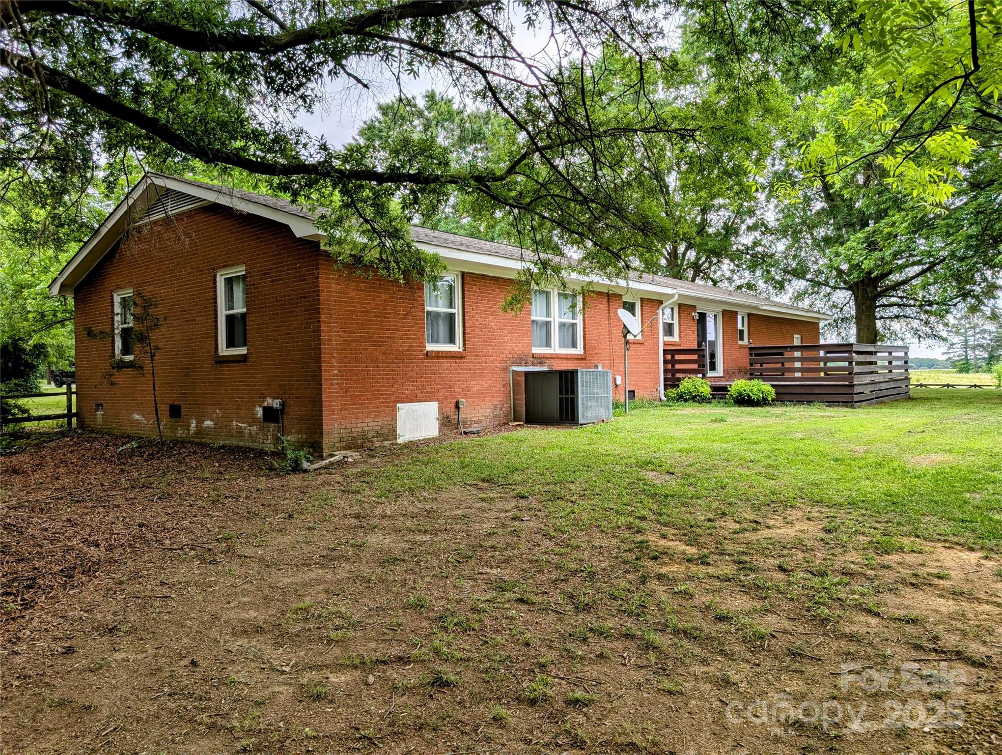5628 White Store Road Wingate, NC 28174 - Photo 4 of 31 a house view with a garden space