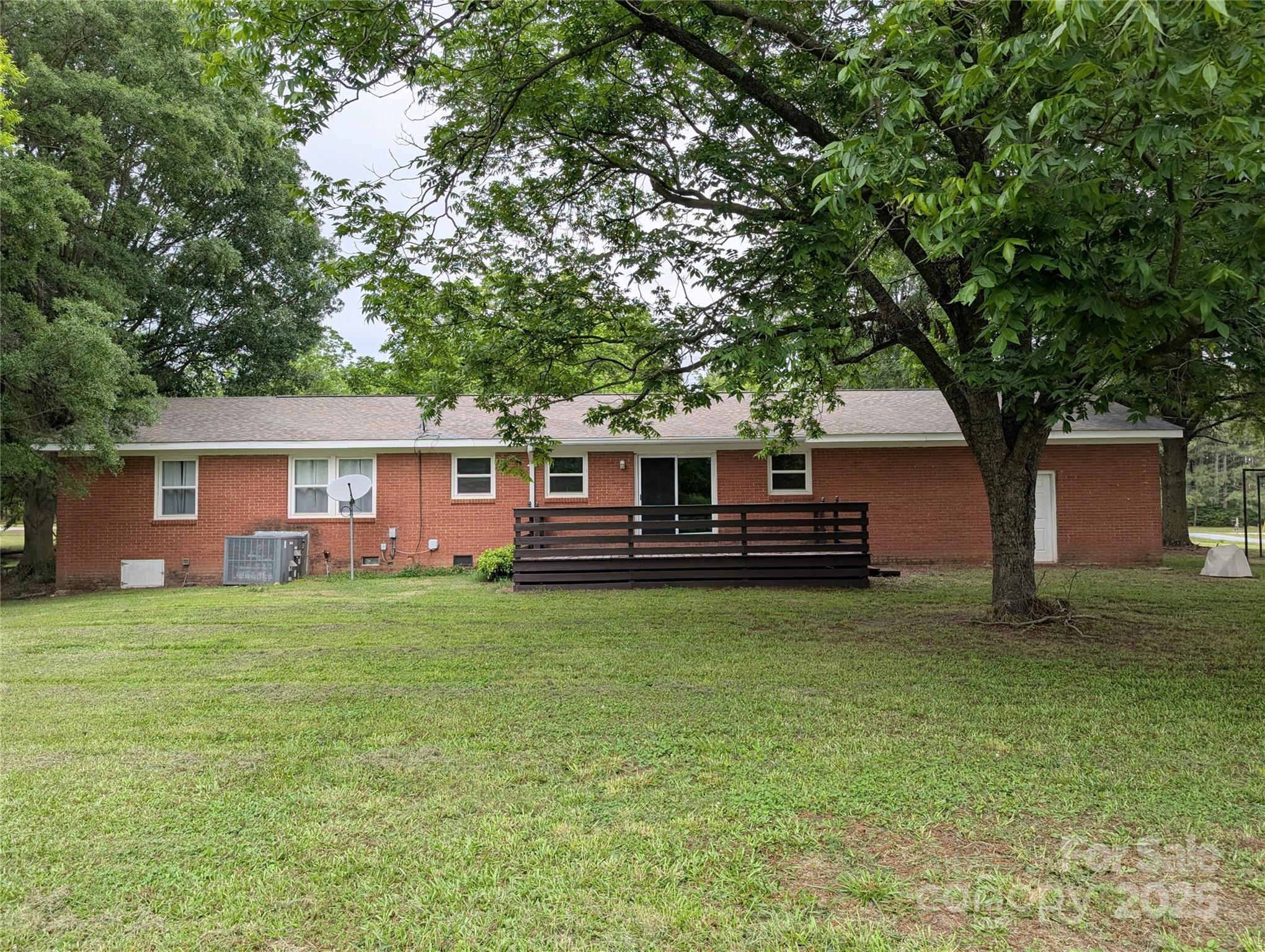 5628 White Store Road Wingate, NC 28174 - Photo 5 of 31 a front view of a house with garden