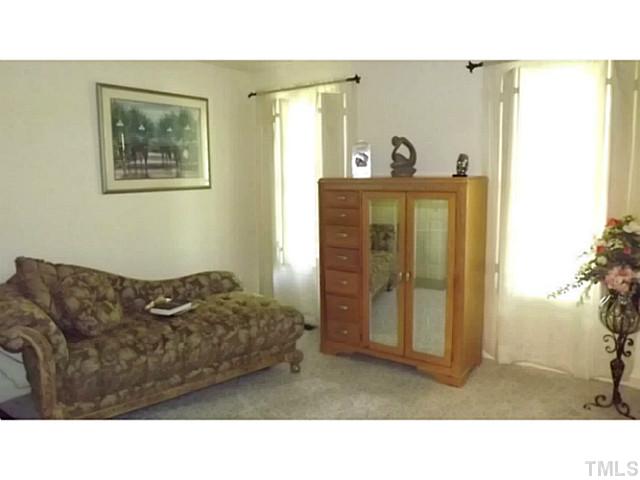 6671 Old Fairground Road Benson, NC 27504 - Photo 11 of 25 a living room with furniture and window