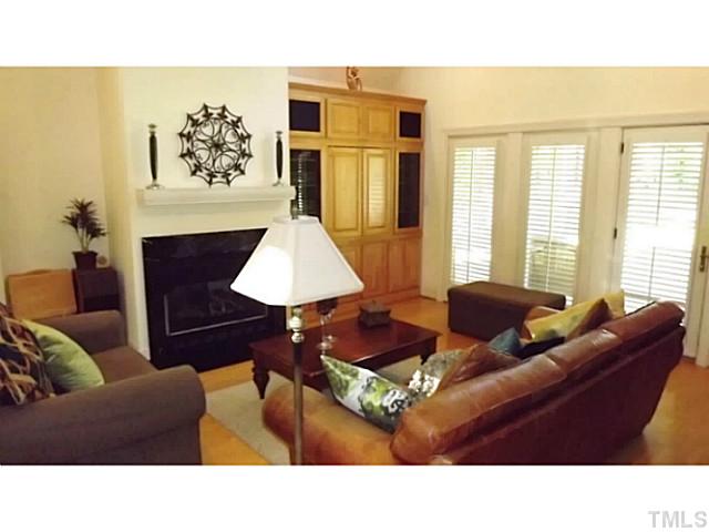 6671 Old Fairground Road Benson, NC 27504 - Photo 13 of 25 a living room with furniture and a window