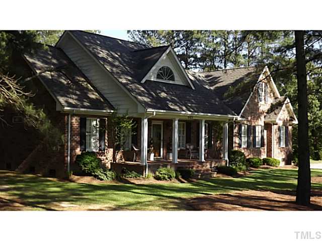 6671 Old Fairground Road Benson, NC 27504 - Photo 3 of 25 a view of a house a park