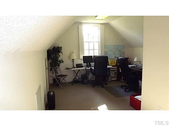 6671 Old Fairground Road Benson, NC 27504 - Photo 23 of 25 a living room with furniture and a window