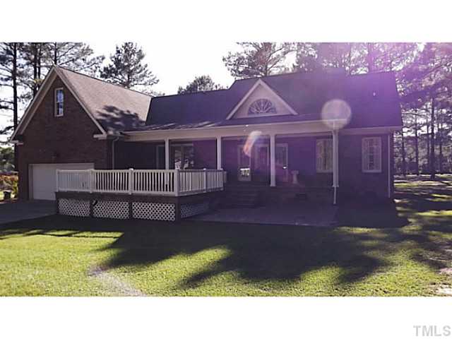 6671 Old Fairground Road Benson, NC 27504 - Photo 5 of 25 a house view with a garden space