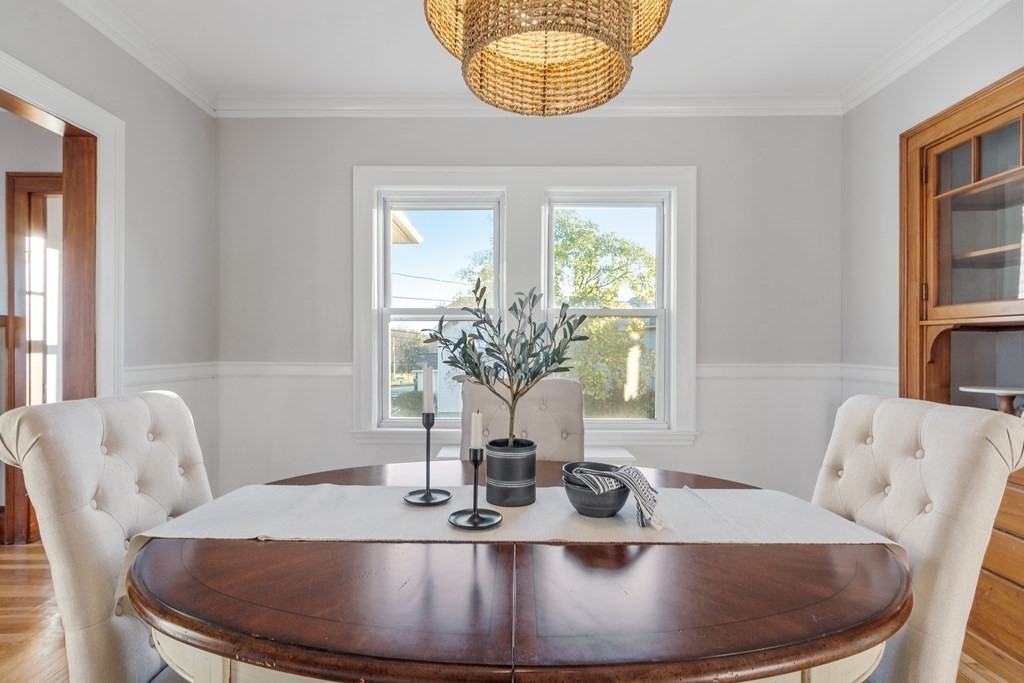 10 Victoria Road, Unit 2 Arlington, MA 02474 - Photo 13 of 28 a dining room with wooden floor
