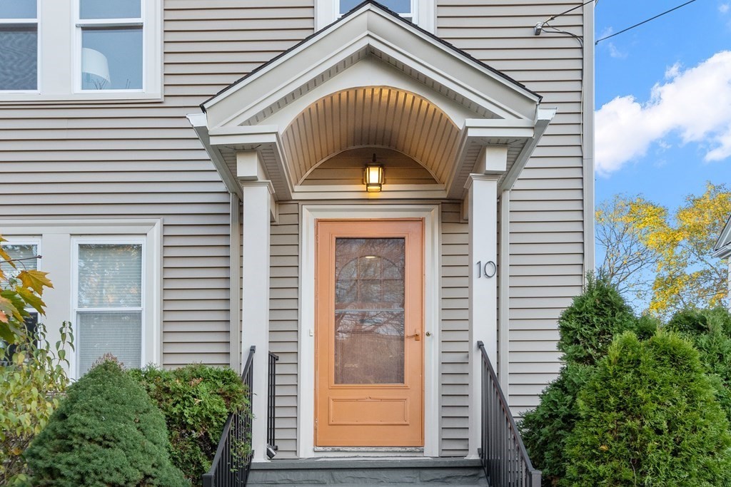 10 Victoria Road, Unit 2 Arlington, MA 02474 - Photo 2 of 28 a front view of a house with a window