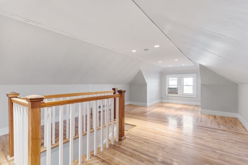 10 Victoria Road, Unit 2 Arlington, MA 02474 - Photo 24 of 28 a view of entryway with wooden floor