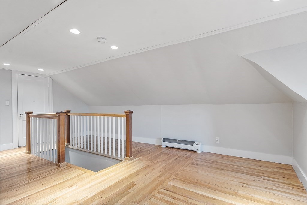10 Victoria Road, Unit 2 Arlington, MA 02474 - Photo 25 of 28 a view of a livingroom with wooden floor