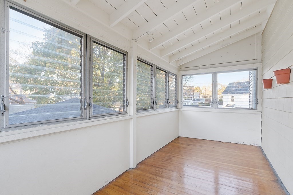 10 Victoria Road, Unit 2 Arlington, MA 02474 - Photo 26 of 28 a view of an empty room with a window