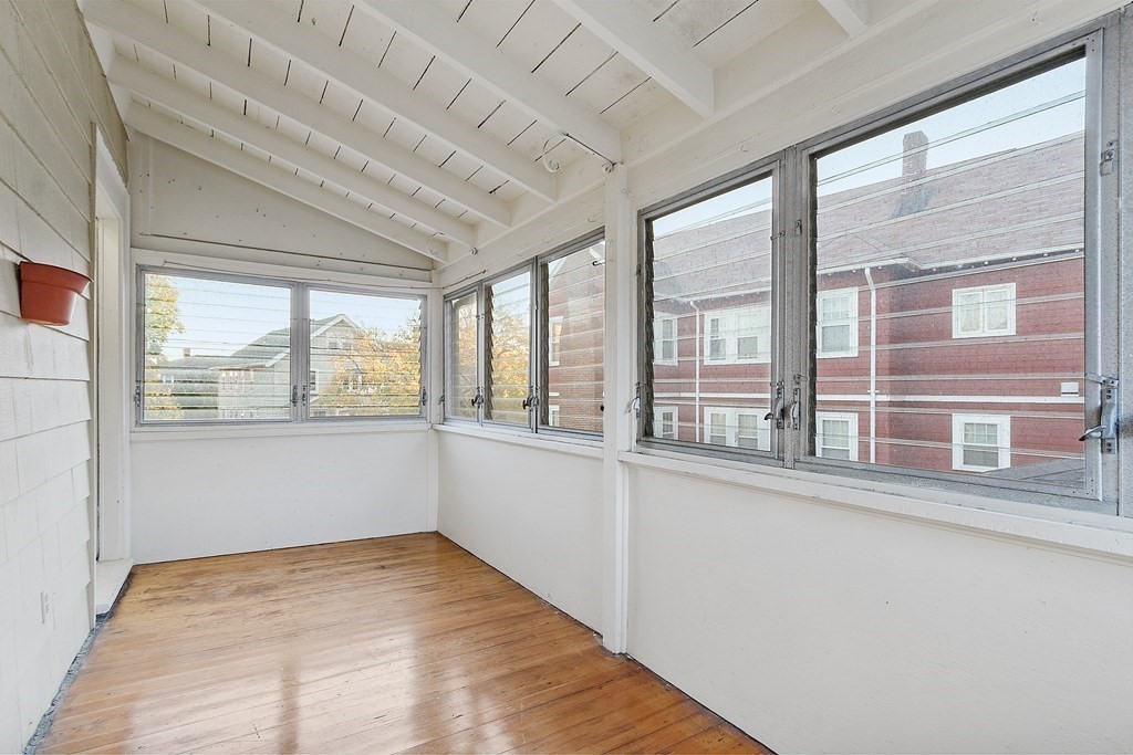10 Victoria Road, Unit 2 Arlington, MA 02474 - Photo 27 of 28 a view of an empty room with a window