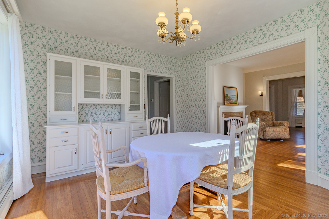 1152 Worthington Ridge Berlin, CT 06037 - Photo 9 of 40 a view of a dining room with furniture and wooden floor