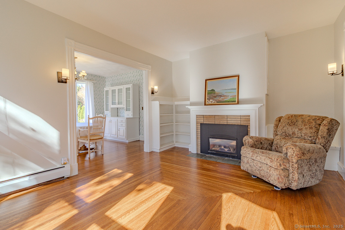 1152 Worthington Ridge Berlin, CT 06037 - Photo 10 of 40 a living room with furniture and a fireplace