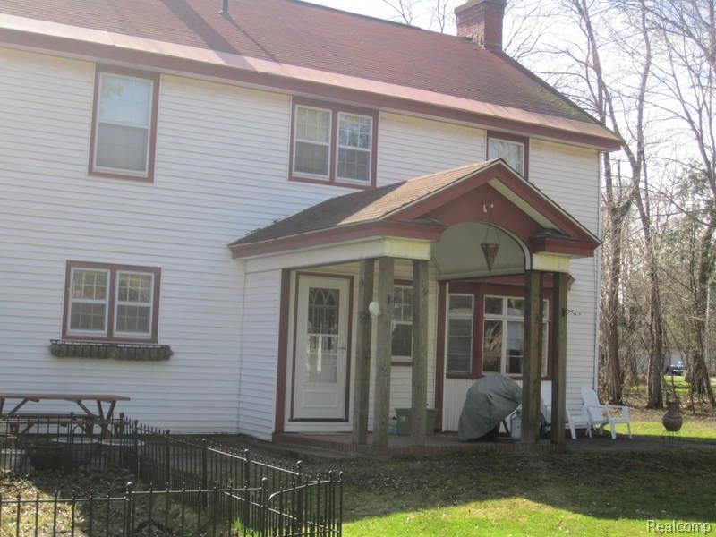 304 Mission Road Sault Ste. Marie, MI 49783 - Photo 19 of 25 Back of House.jpg