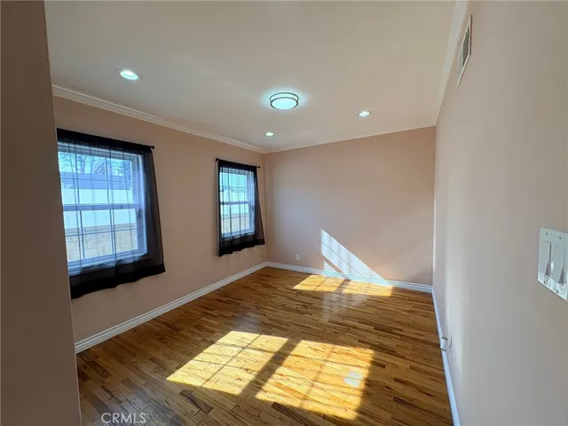 a view of an empty room and window