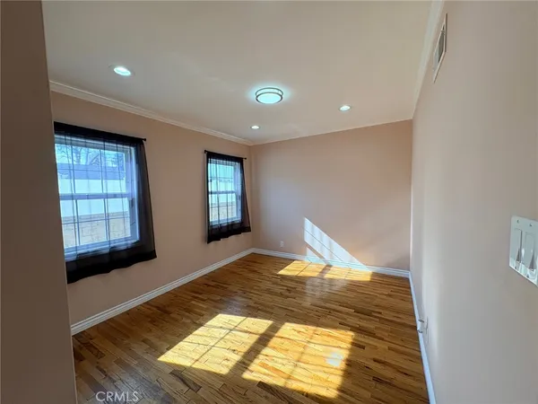 a view of an empty room and window