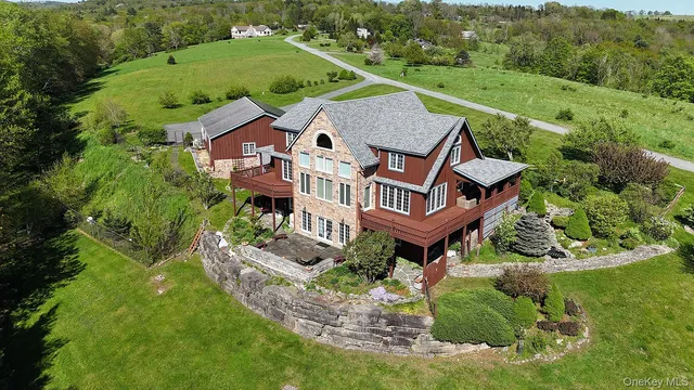 an aerial view of a house with a garden