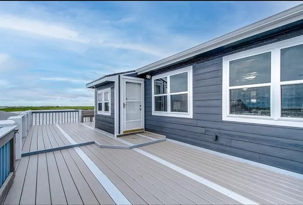 a view of a balcony with an outdoor space