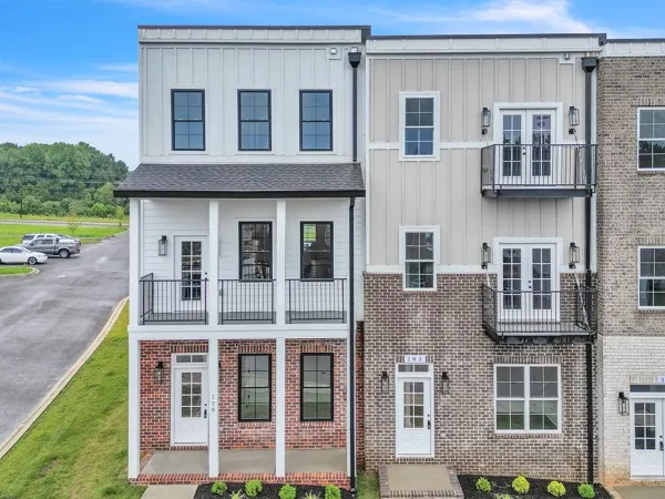 a large brick building with a large windows