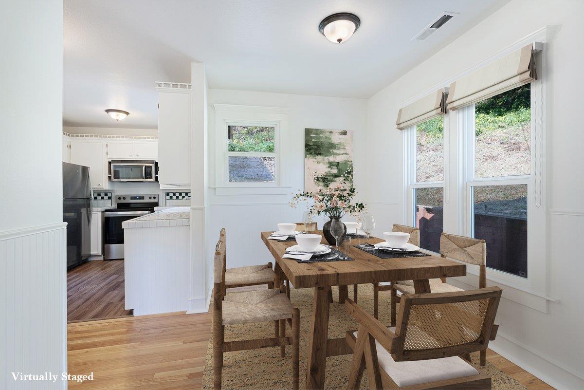 225 Owl Ridge Way Aptos, CA 95003 - Photo 11 of 26 a view of a dining room with furniture window and outside view
