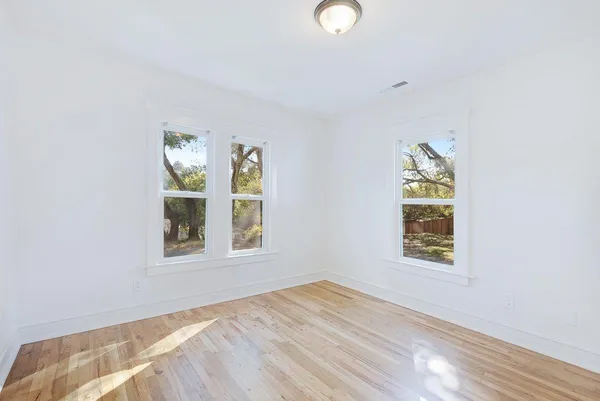 an empty room with windows